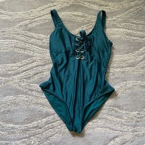 Green one piece bathing suit